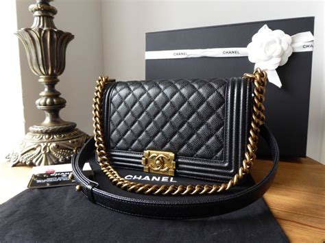 chanel boy bag gold hardware|chanel black boyfriend bag.